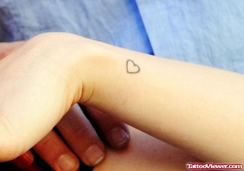 Awesome Tiny Heart Tattoo On Wrist