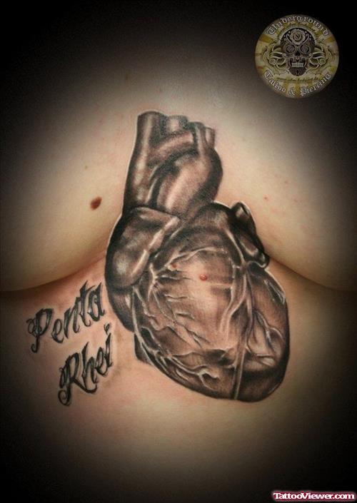 Grey Ink Realistic Heart Tattoo