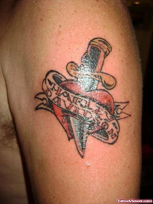 Banner And Daager Heart Tattoo On Bicep