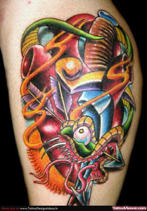 Colored Dagger Heart Tattoo On Leg