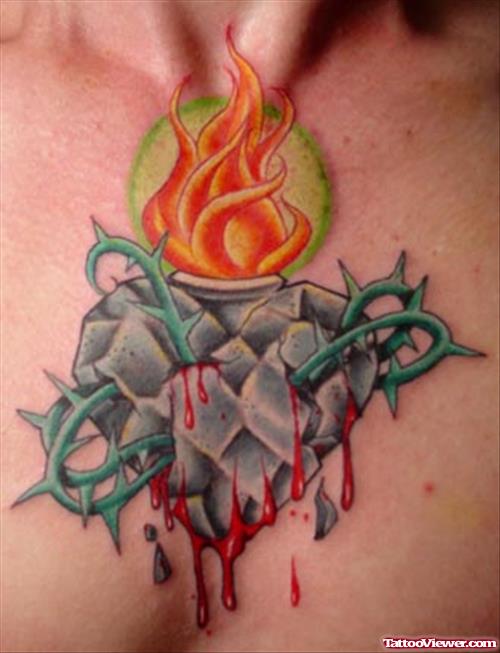 Burning Heart Tattoo On Man Chest
