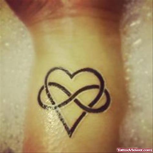 Beautiful Infinity Symbol And Heart Tattoo On Wrist