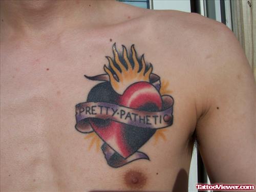 Banner And Burning Heart Tattoo On Chest