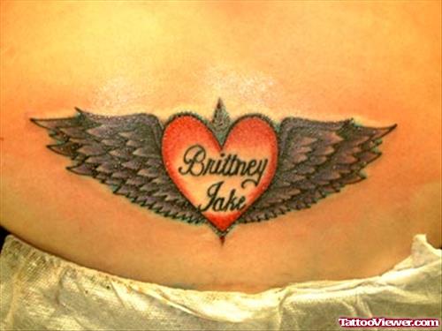 Awesome Winged Red Heart Tattoo On Lowerback