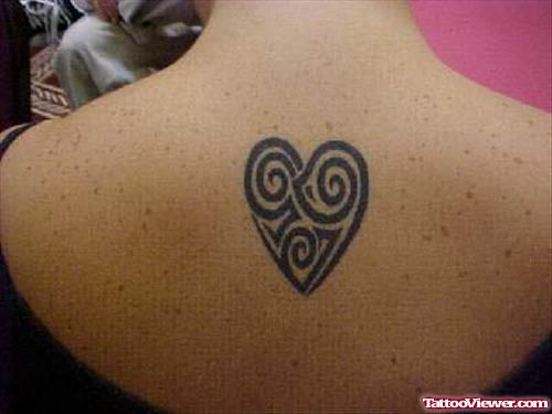 Tribal Spiral Heart Tattoo On Upperback
