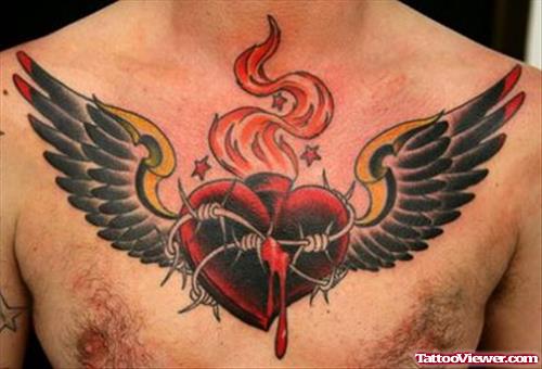 Winged Burning Heart Tattoo On Chest