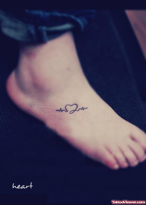 Outline Heart And Heartbeat Tattoo On Foot