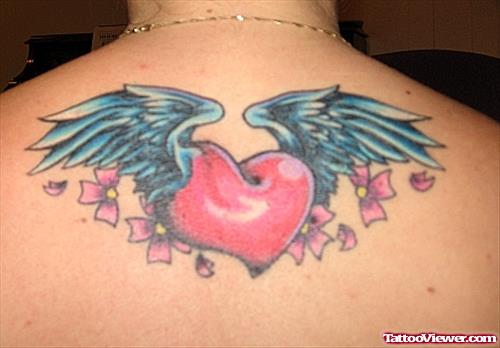 Crazy Winged Heart Tattoo On Upperback