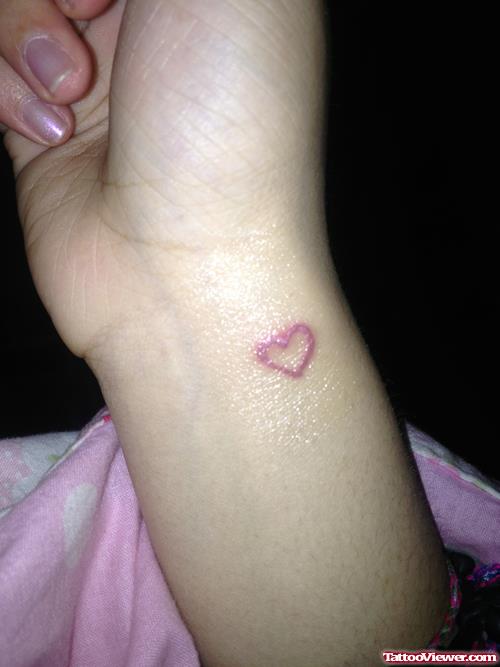 Tiny Heart Tattoo On Wrist