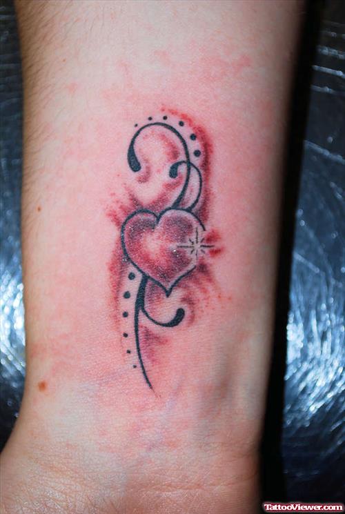Swirl Heart Tattoo On Wrist