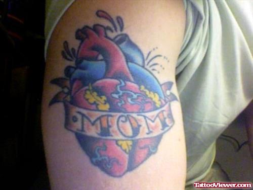 Mom Banner And Heart Tattoo On Bicep