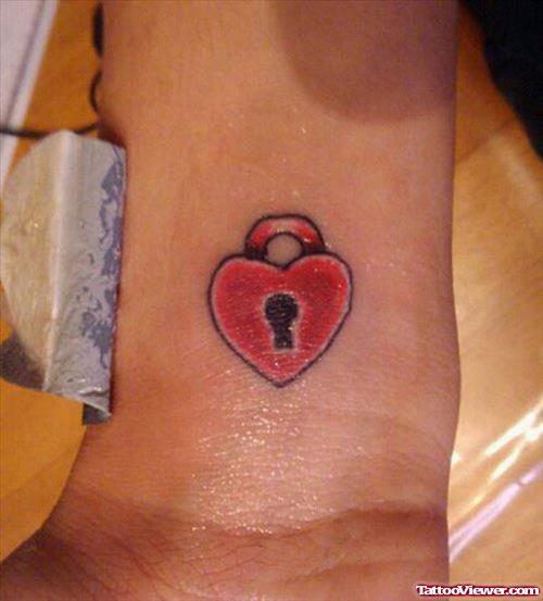 Red Lock Heart Tattoo On Wrist