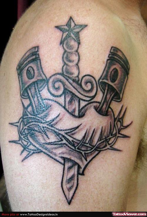 Grey Ink Dagger Heart With Pistons Tattoo On Shoulder