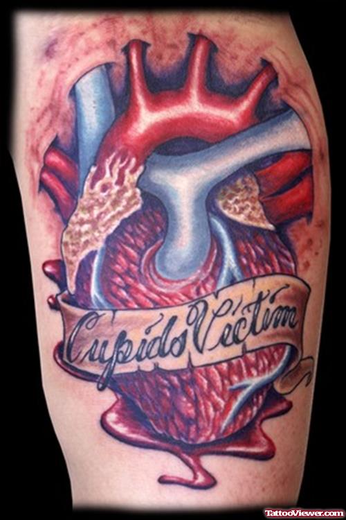 Cupids Victim Banner and Human Heart Tattoo