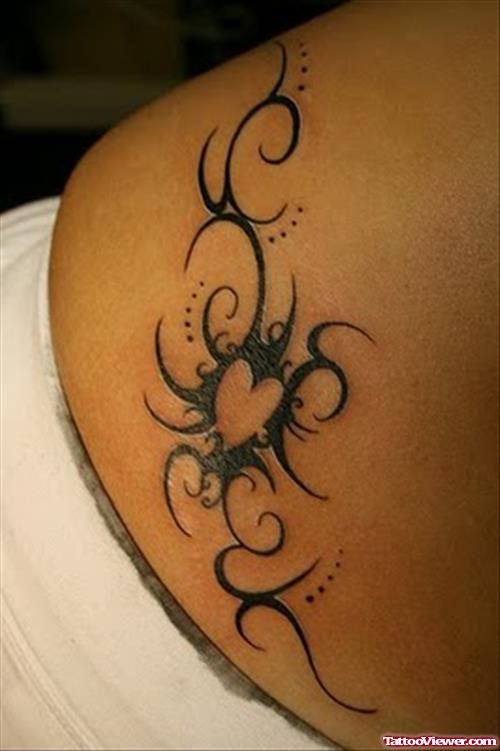 Black Tribal Heart Tattoo On Side