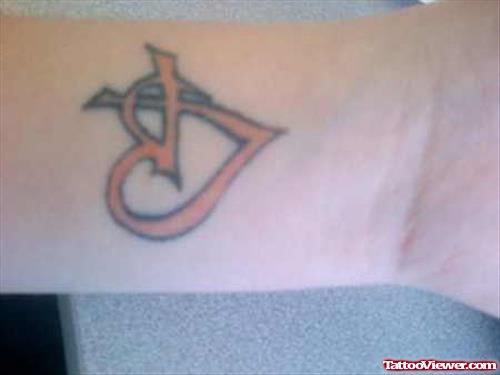 Cross and Heart Tattoo On Wrist