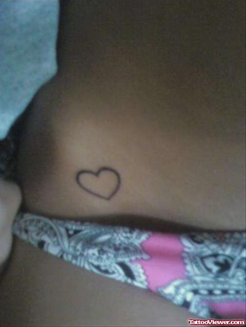 Tiny Heart Tattoo On Hip