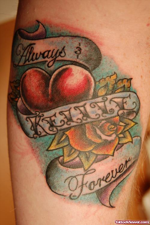 Flower And Heart With Banner Tattoo