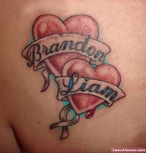 Brandon Liam Banner And Heart Tattoos
