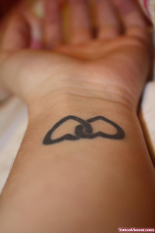 Black Heart Tattoos On Wrists