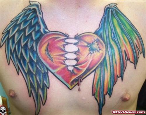 Winged Heart Tattoo On Man Chest