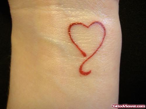 Wesome Red Heart Tattoo On Wrist