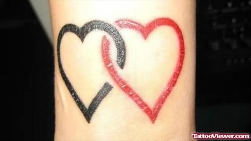 Elegant Black And Red Heart Tattoo