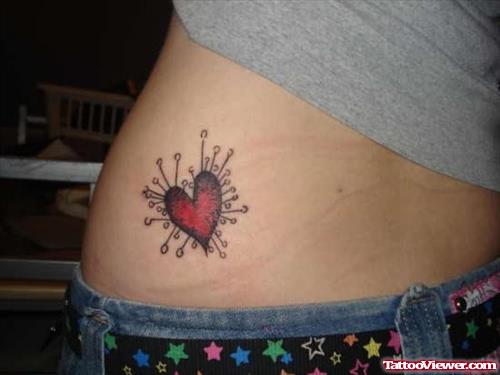Pinched Heart Tattoo On Waist