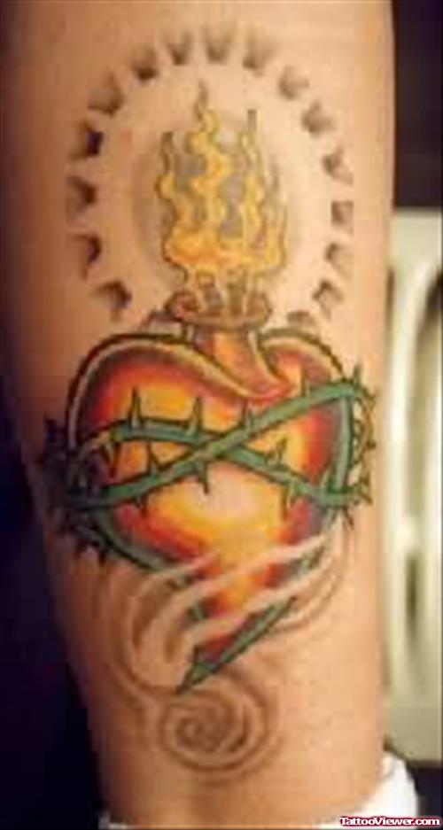 Heart Tattoo In Fire On Leg