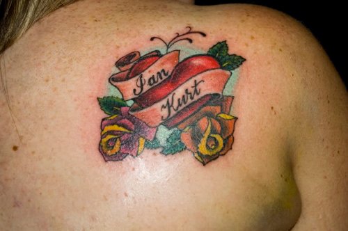Jan Kurt Banner And Heart Tattoo