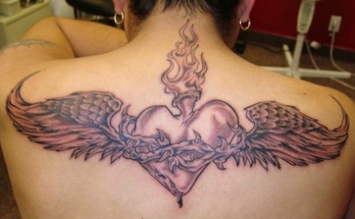 Grey Ink Winged Burning Heart Tattoo On Upperback