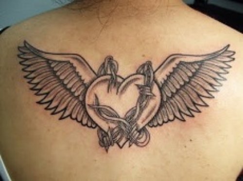 Grey Ink Winged Heart Tattoo On Upperback