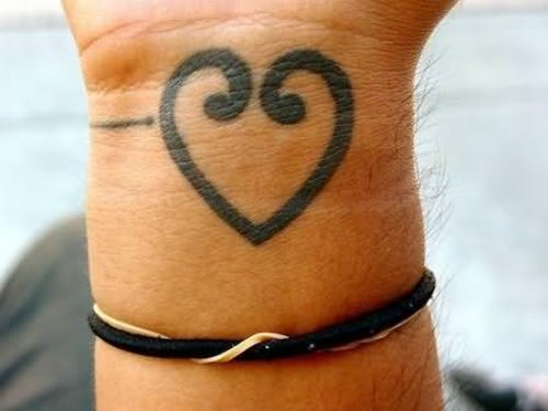 Black Ink Heart Tattoo On Right Wrist