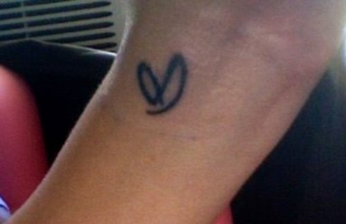 Amazing Black Heart Tattoo On Wrist