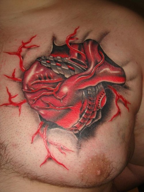 Awesome Red Heart Tattoo On Man Chest