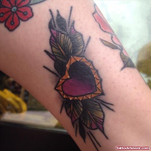 love heart with petals tattoo