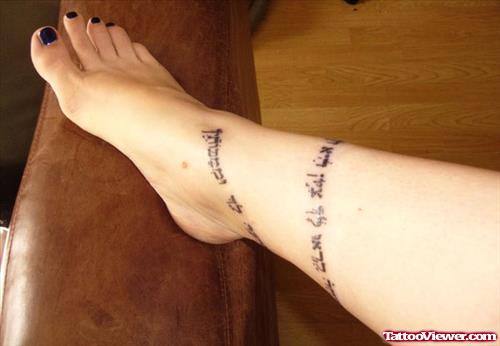 Black Ink Hebrew Tattoo On Leg
