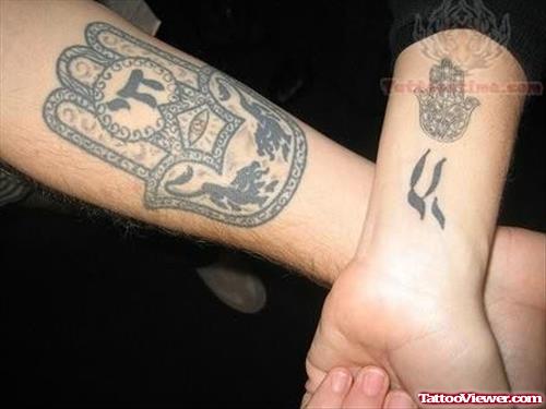 Symbolic Hand Tattoo Design