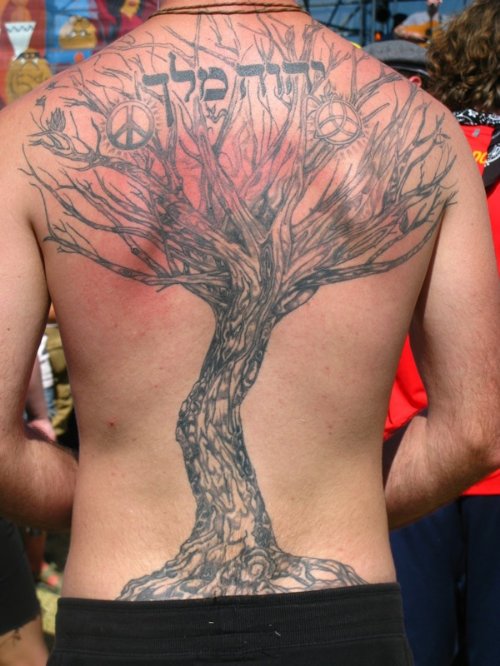Grey Ink Large Tree Hebrew Tattoo On Back
