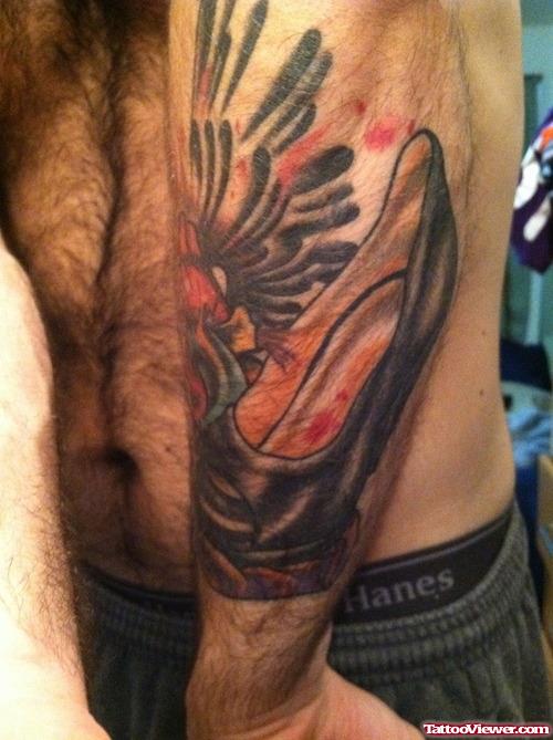 Man Left Sleeve Heel Tattoo