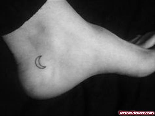 Tiny Moon Heel Tattoo