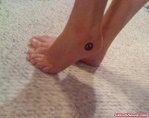 Small Peace Symbols Heel Tattoo
