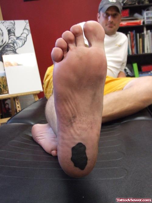 Black Ink Map Under Heel Tattoo