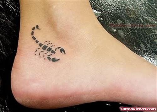 Nice Black Ink Scorpio Heel Tattoo