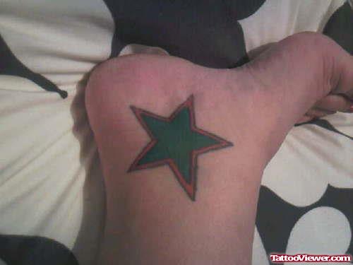 Green Ink Star Heel Tattoo