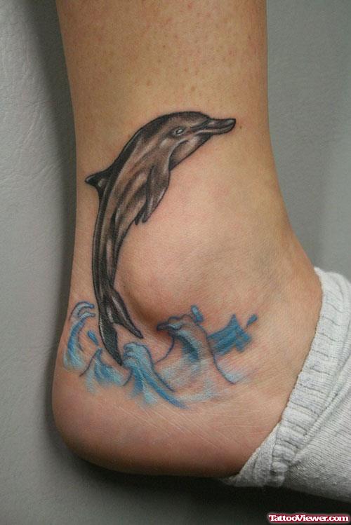 Dolphins Heel Tattoo For Girls