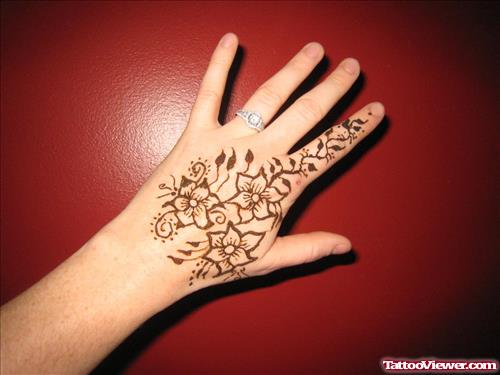 Henna Flowers Tattoos On Left Hand