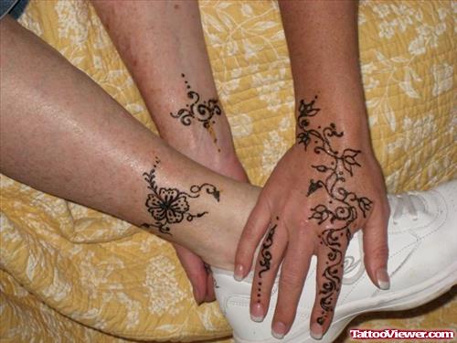 Henna Tattoos On Hand And Leg