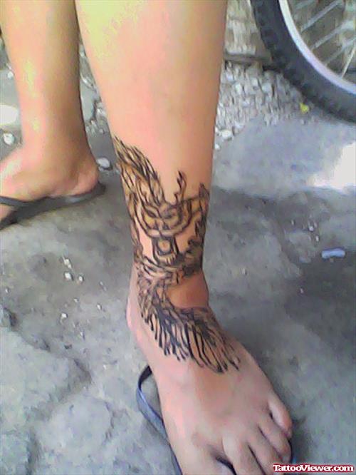 Grey Ink Henna Tattoo On Left Foot