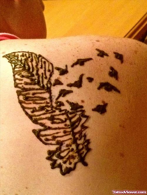 Flying Birds From Feather Henna Tattoo On Back Shoulder